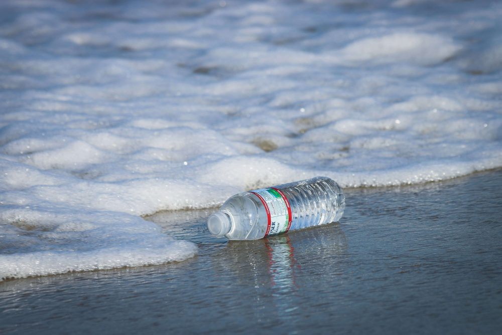 plastic water bottle on beach